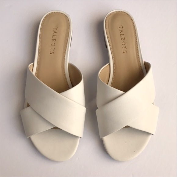 white cross flat sandals